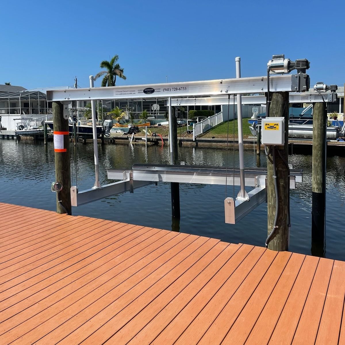 Custom boat dock built over calm Gulf Coast water